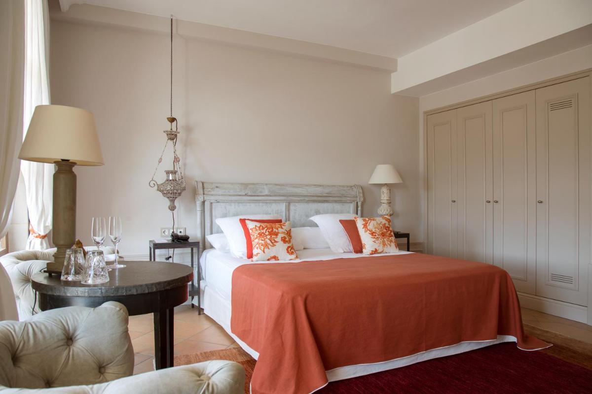 Cama o camas de una habitación en Casa Anamaria Hotel
