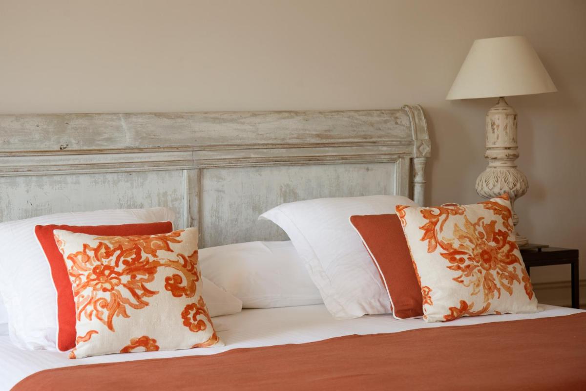 Cama o camas de una habitación en Casa Anamaria Hotel