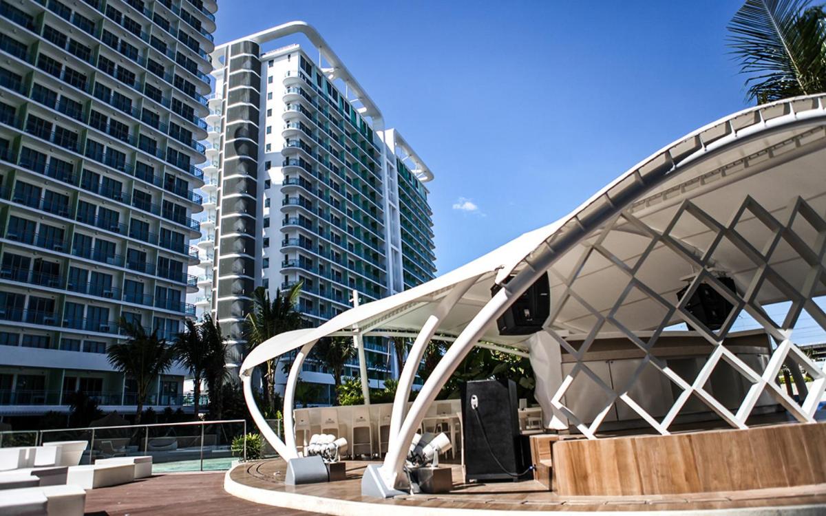 Azure Urban Resort Residences - The Paris Hilton Beach Club - Hizvo