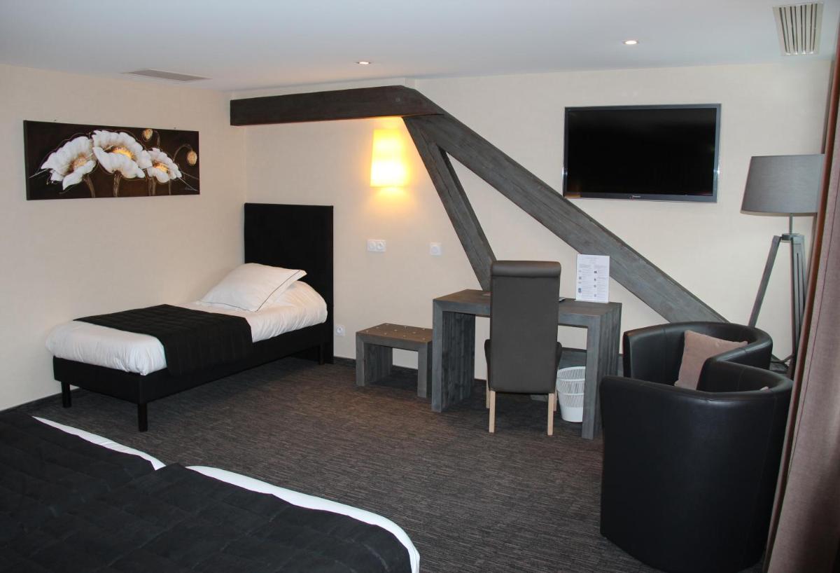 Un ou plusieurs lits dans un hébergement de l'établissement Hotel de la Jamagne & Spa