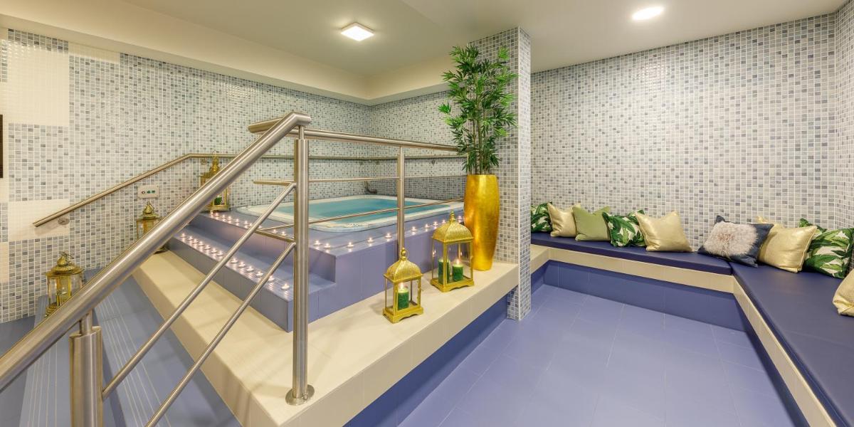 Uma cama ou camas num quarto em Aurea Fatima Hotel Congress & Spa