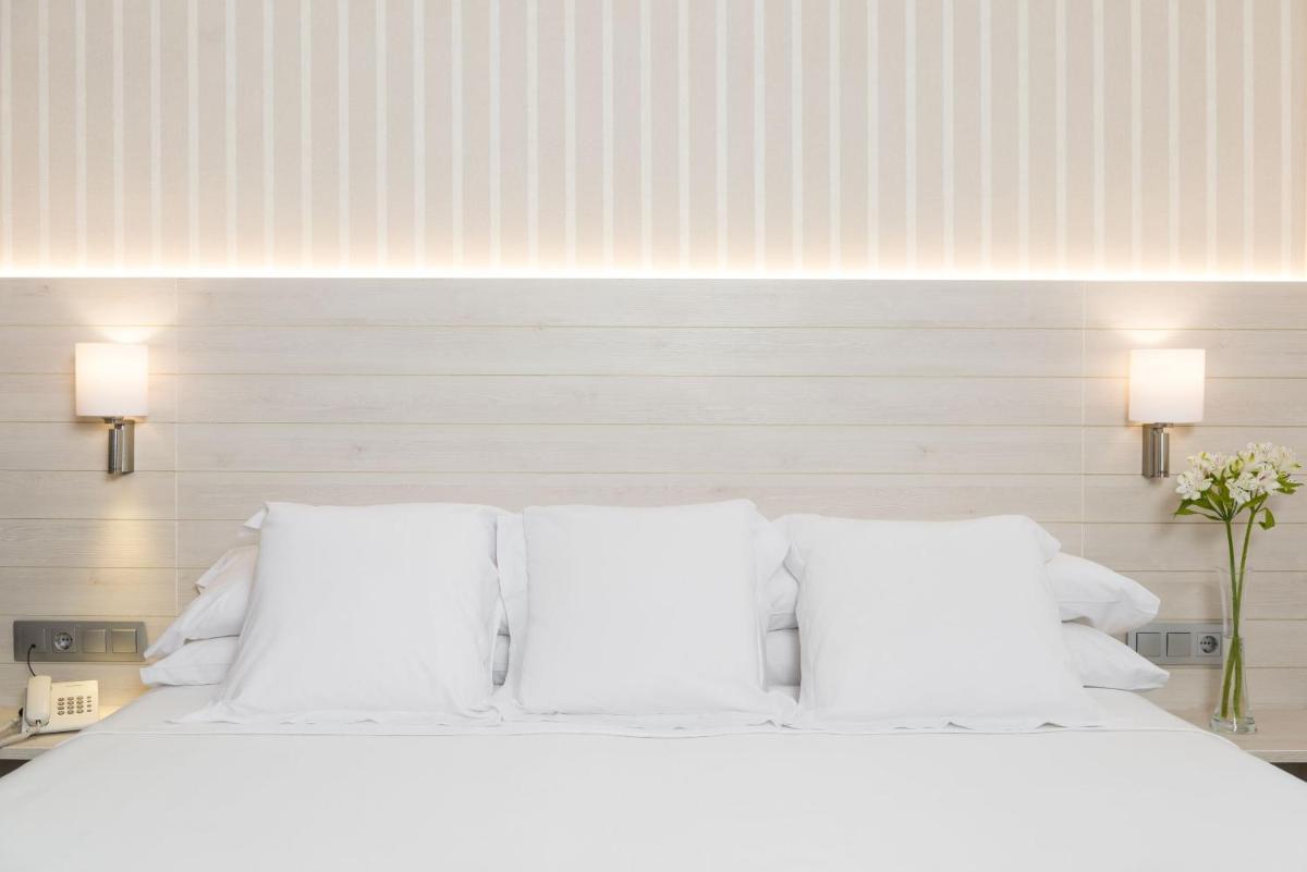 Cama o camas de una habitación en Hotel Marsol