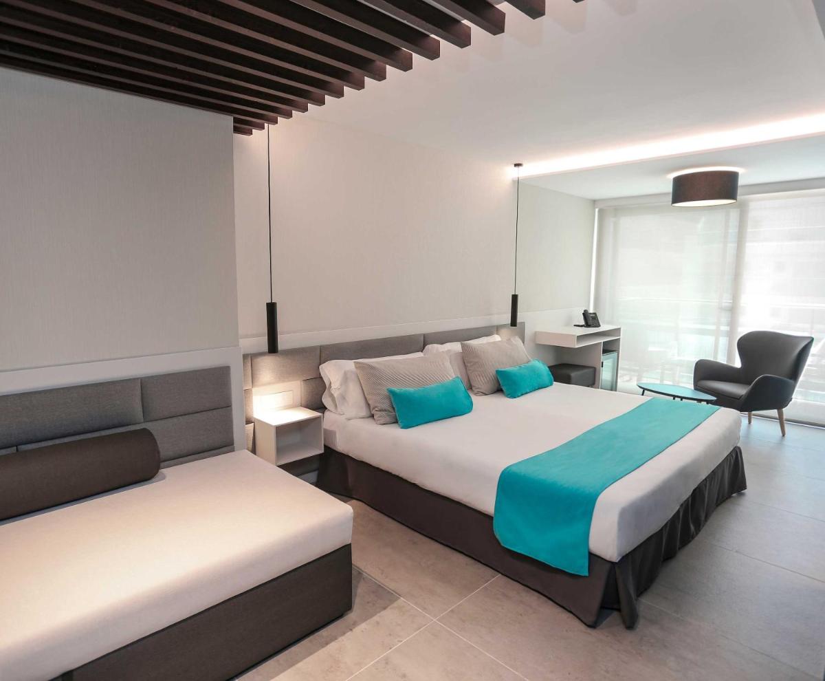 Cama o camas de una habitación en KAKTUS Hotel Kaktus Playa - Adults Recommended