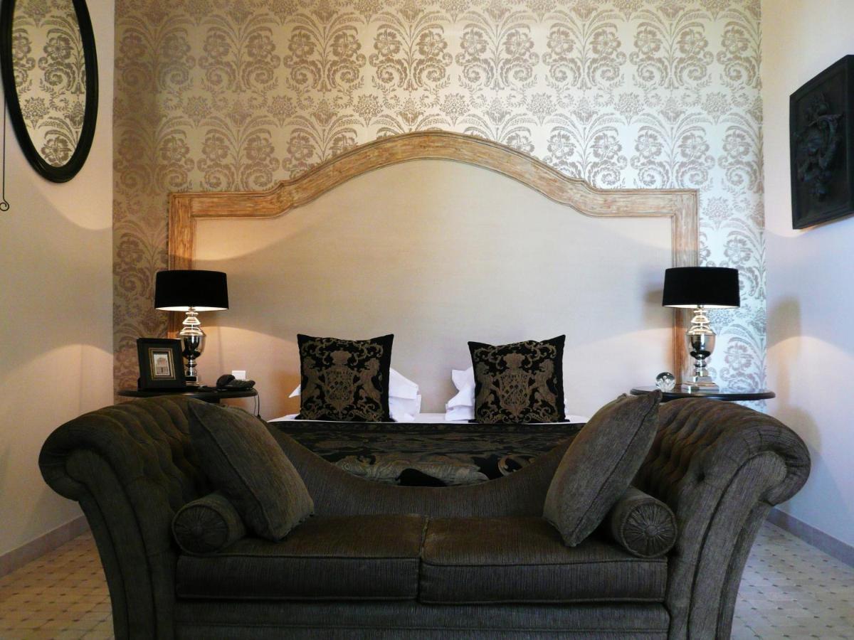 Coin salon dans l'établissement Beaumanoir Small Luxury Boutique Hotel