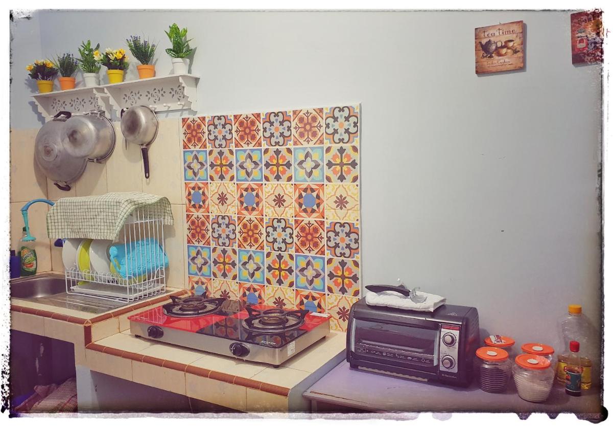 Rumah Ayin Homestay Near Airport - Housity