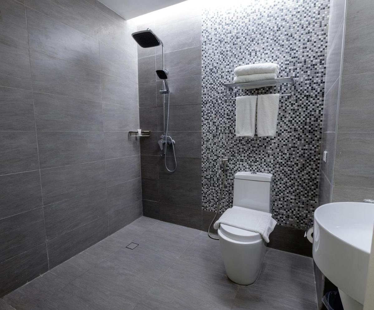 One Central Hotel & Suites - Housity