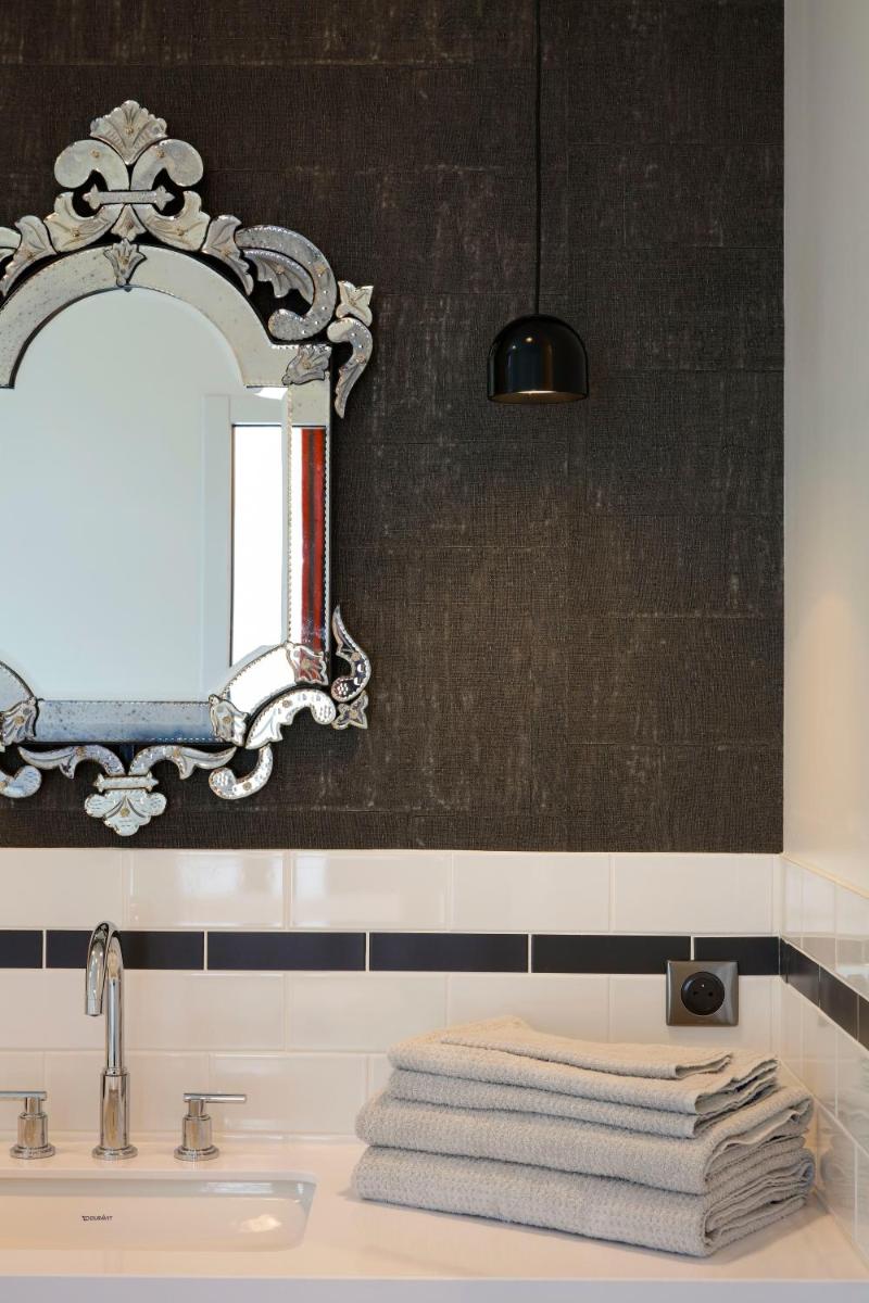 Salle de bains dans l'établissement Continental Hotel