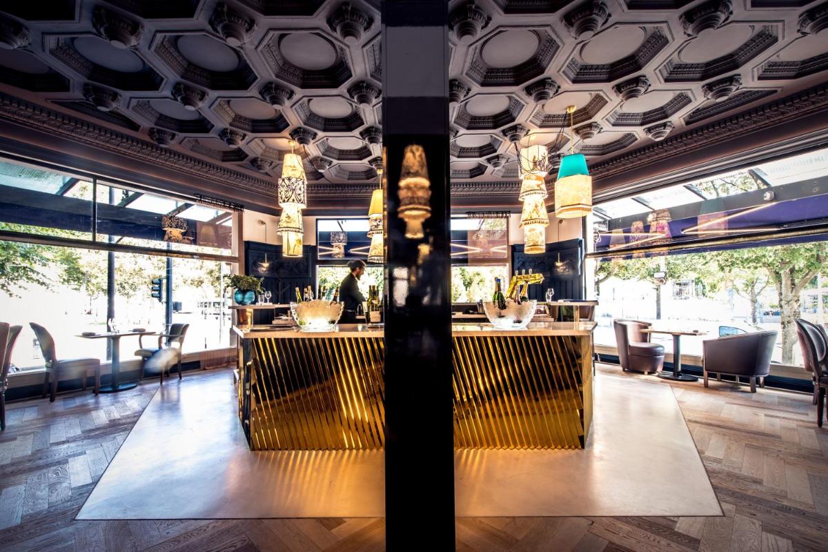 Restaurant ou autre lieu de restauration dans l'établissement Continental Hotel