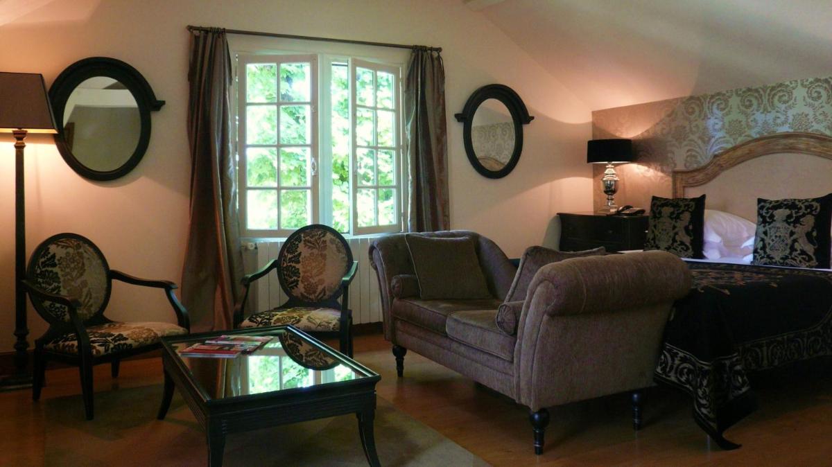 Coin salon dans l'établissement Beaumanoir Small Luxury Boutique Hotel