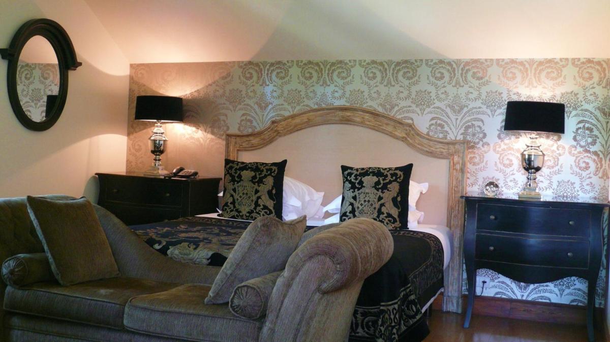 Coin salon dans l'établissement Beaumanoir Small Luxury Boutique Hotel