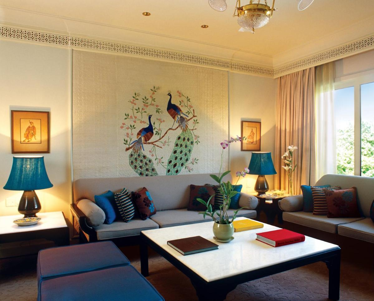 a living room with a couch and a table at Taj Bengal in Kolkata