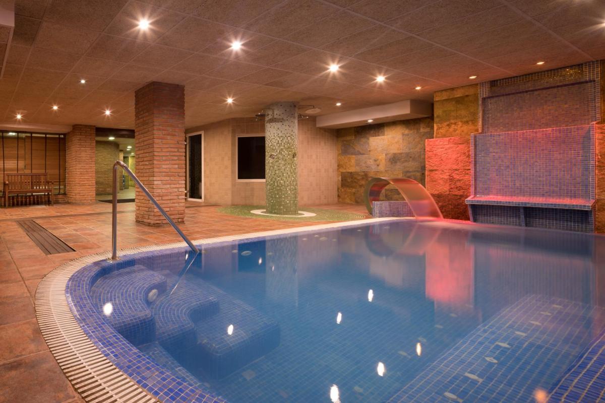 Piscina en o cerca de htop Palm Beach & SPA #htopEnjoy