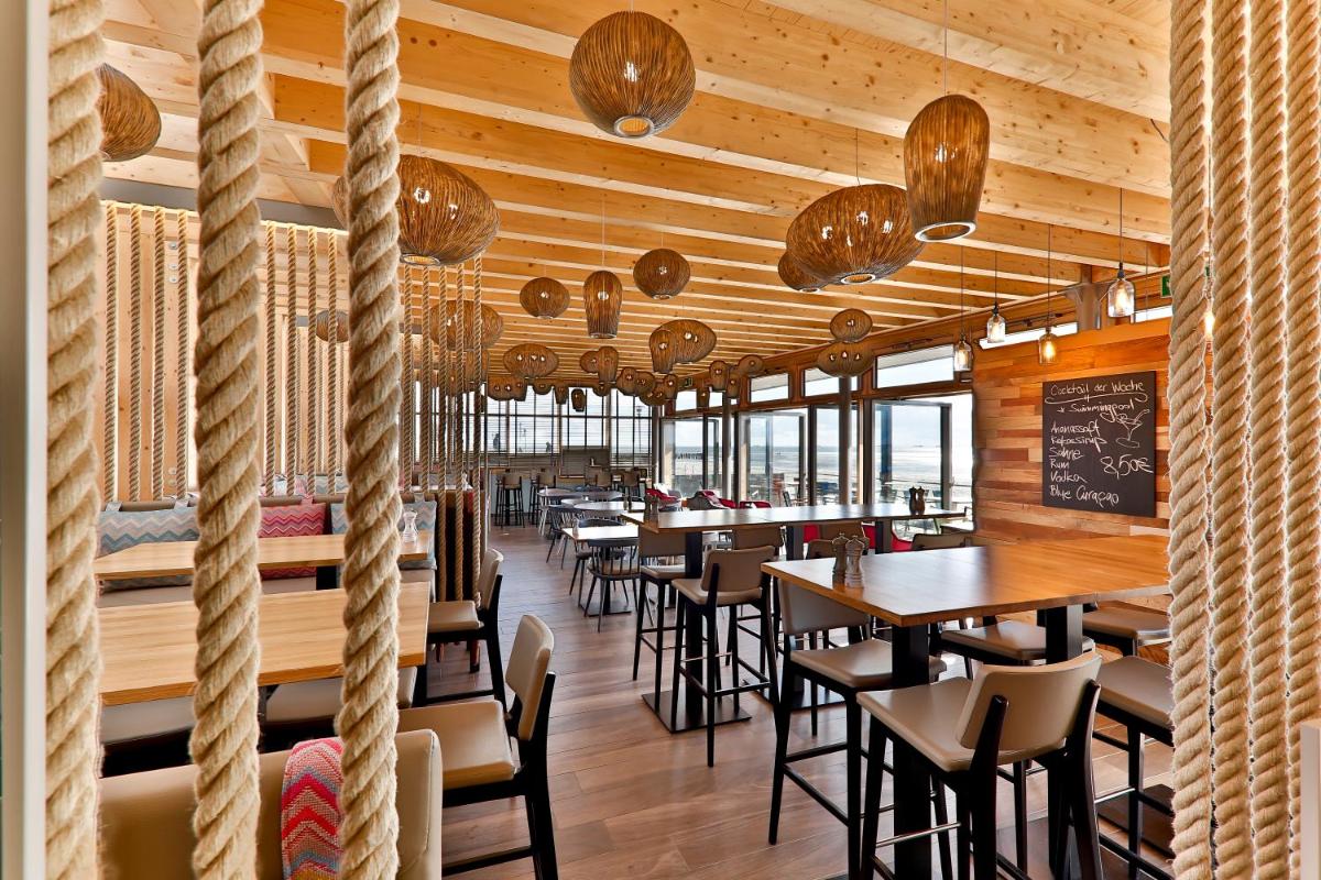 Ein Restaurant oder anderes Speiselokal in der Unterkunft Upstalsboom Wyk auf Föhr