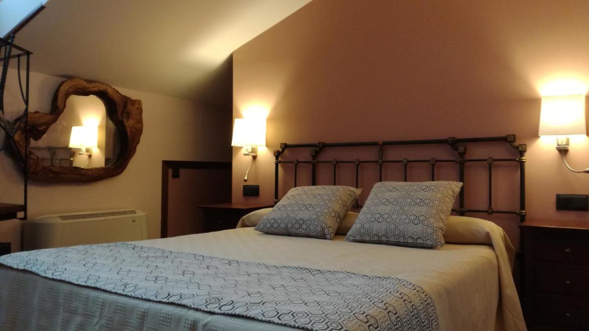Cama o camas de una habitación en Hotel Rural & SPA Puente del Duratón