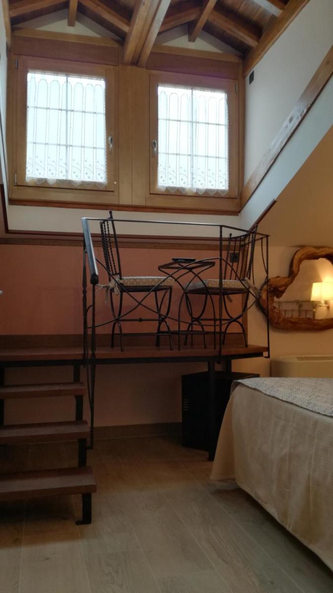 Cama o camas de una habitación en Hotel Rural & SPA Puente del Duratón