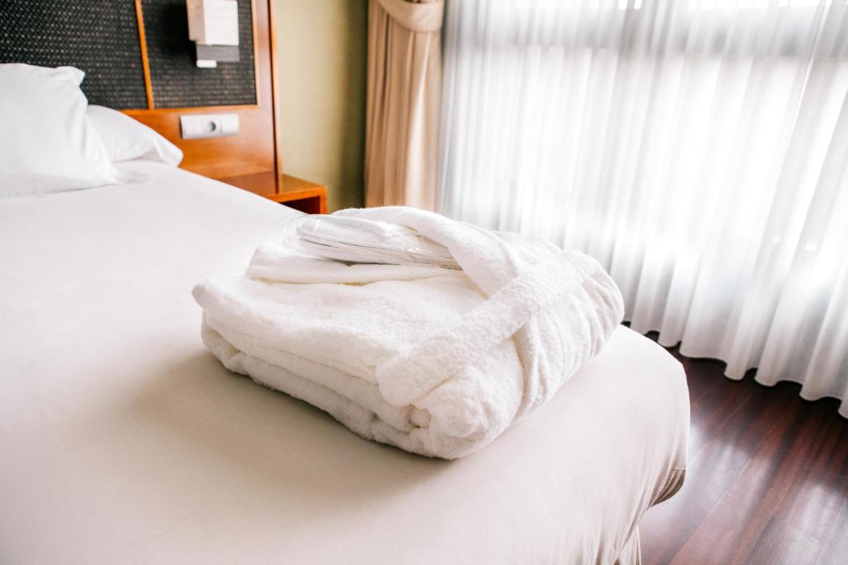 Cama o camas de una habitación en Hosteria de Torazo Nature Hotel & Spa