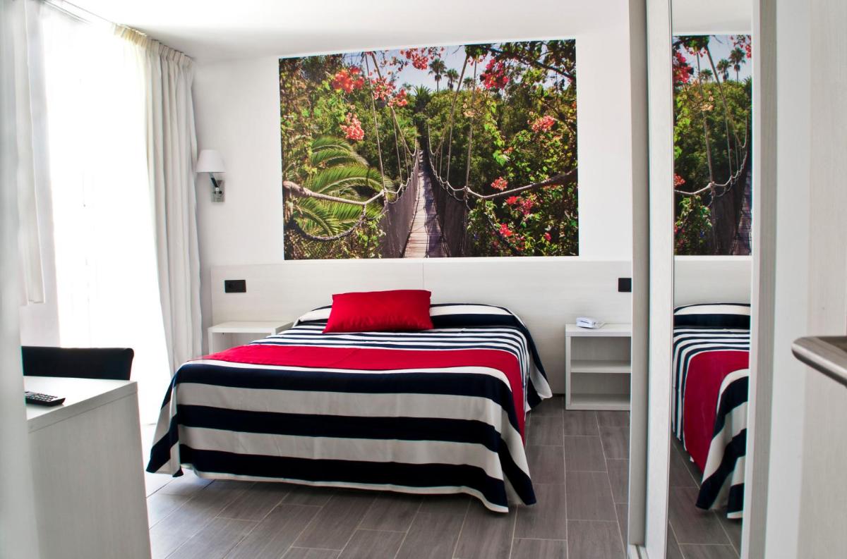Cama o camas de una habitación en Hotel Europa Splash & Spa