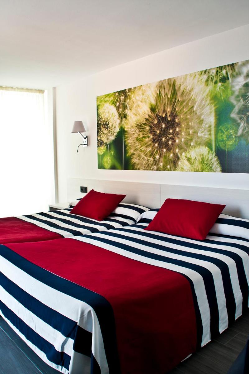 Cama o camas de una habitación en Hotel Europa Splash & Spa