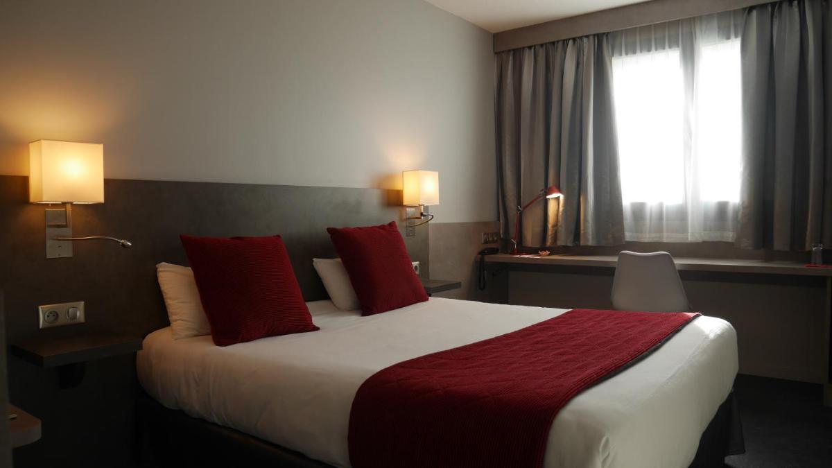 Un ou plusieurs lits dans un hébergement de l'établissement Hotel L'Hotan