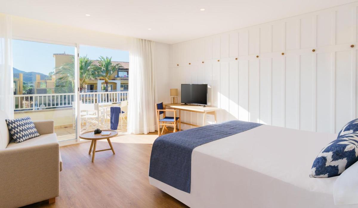 Cama o camas de una habitación en Club del Sol Aparthotel