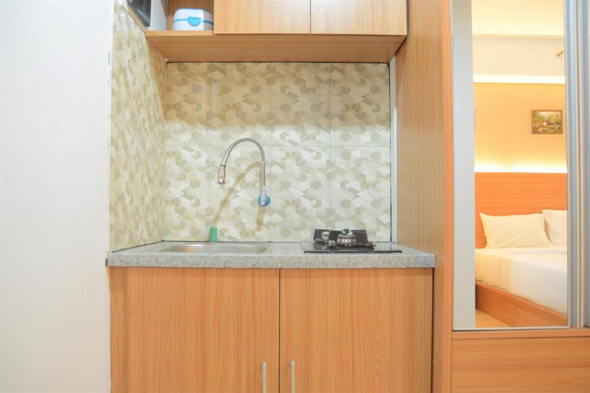Simply Studio Room at Annora Living Apartment Tangerang By Travelio - Housity