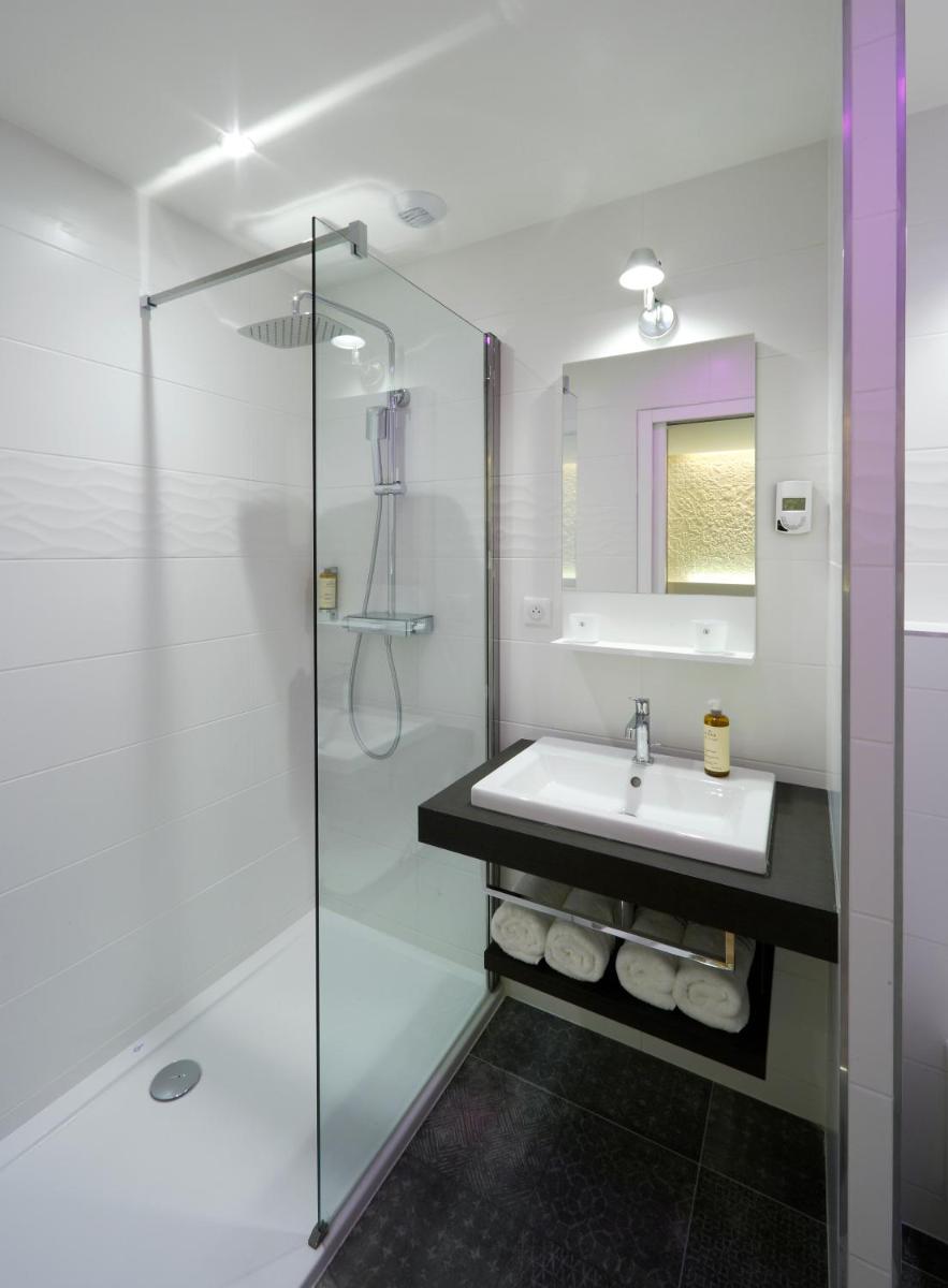Salle de bains dans l'établissement Les Maisons du Pont - Charme & Caractère