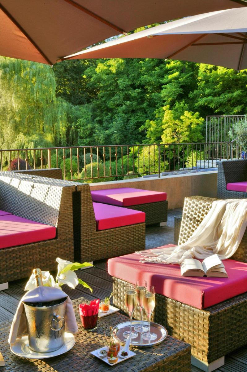 Coin salon dans l'établissement Les Glycines - Hôtel & Spa - Teritoria