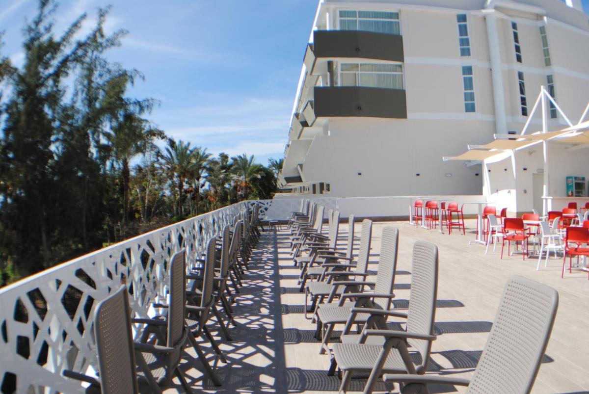 Un balcón o terraza de Gara Suites Golf & Spa