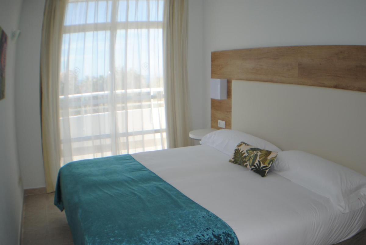 Cama o camas de una habitación en Gara Suites Golf & Spa