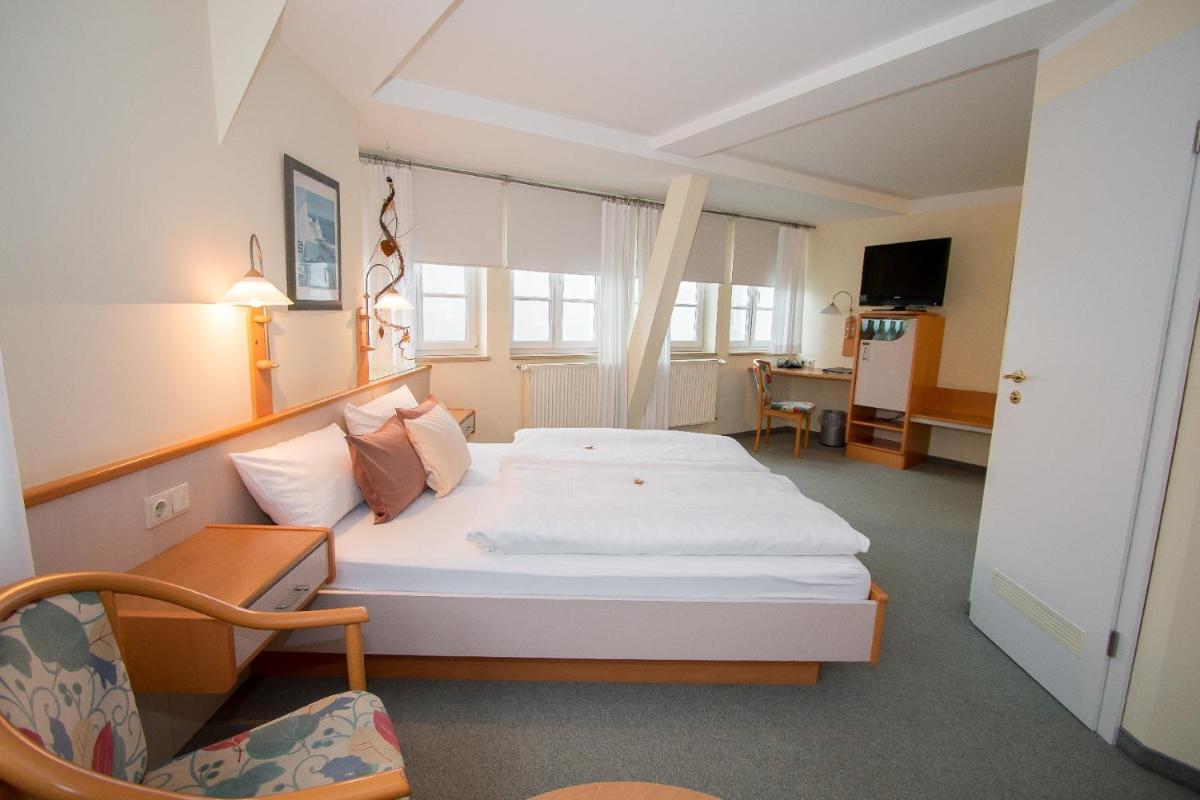 Hotel Garni am Markt - Businesshotel - Frühstücksbuffet - Fahrradabstellplatz - Hunde willkommen - Housity