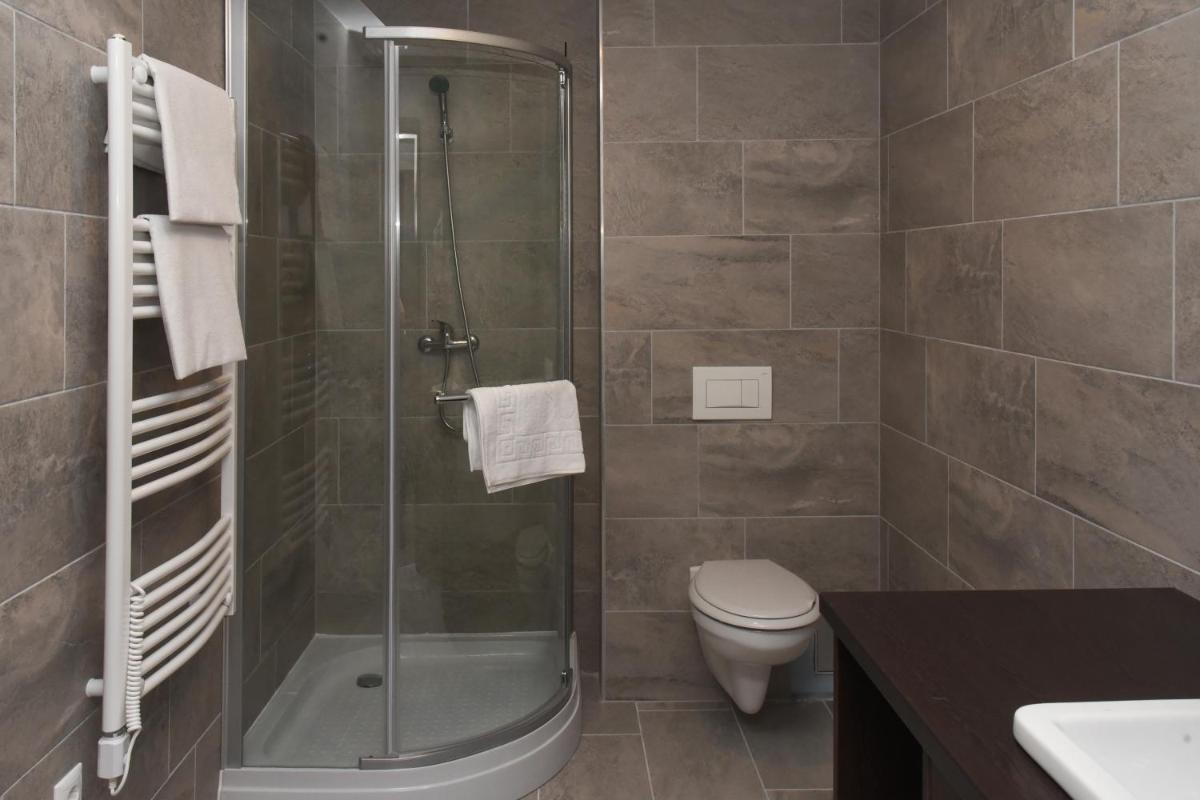 Oázis Wellness Panzio - Housity