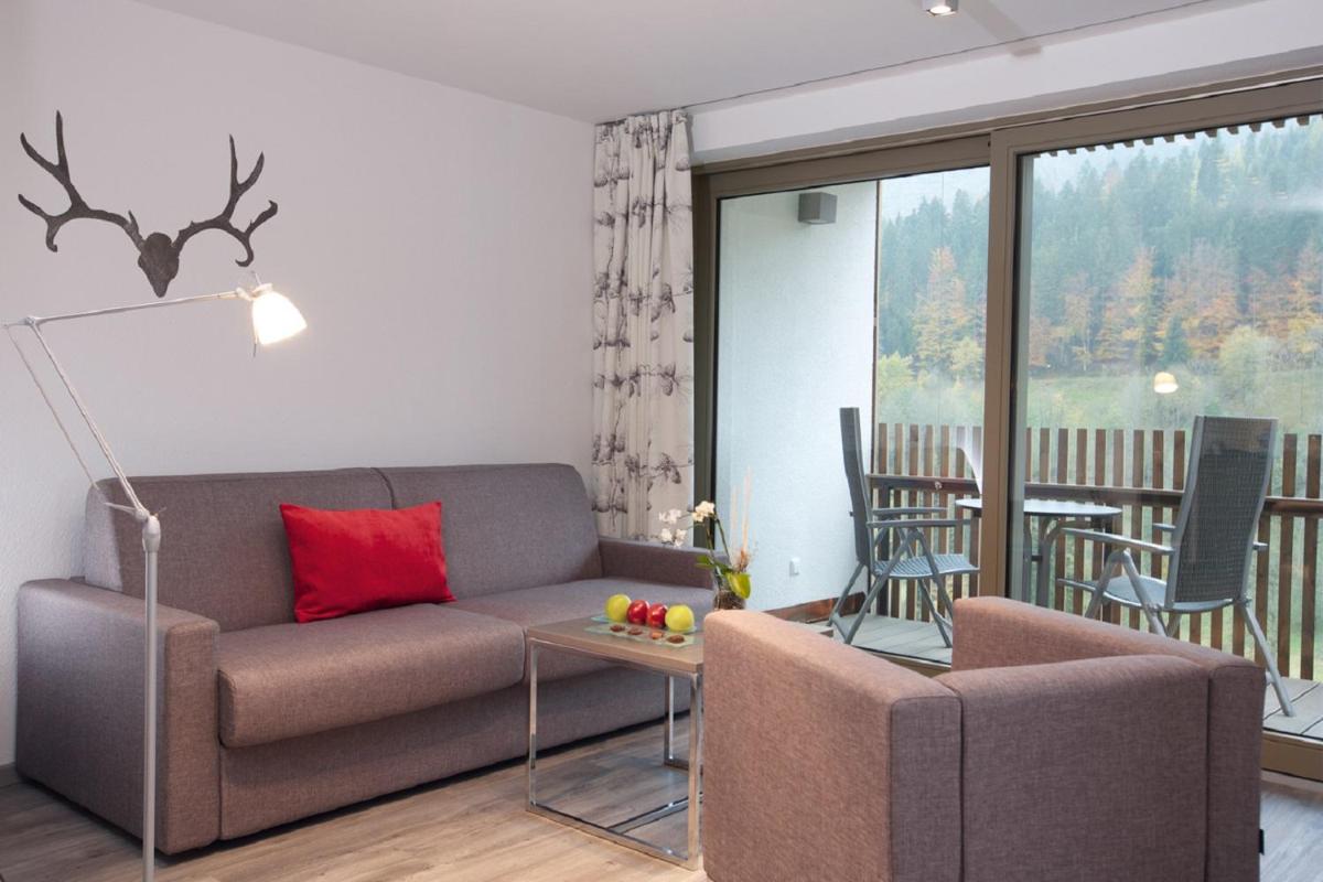 Ein Sitzbereich in der Unterkunft Hotel Traube Tonbach