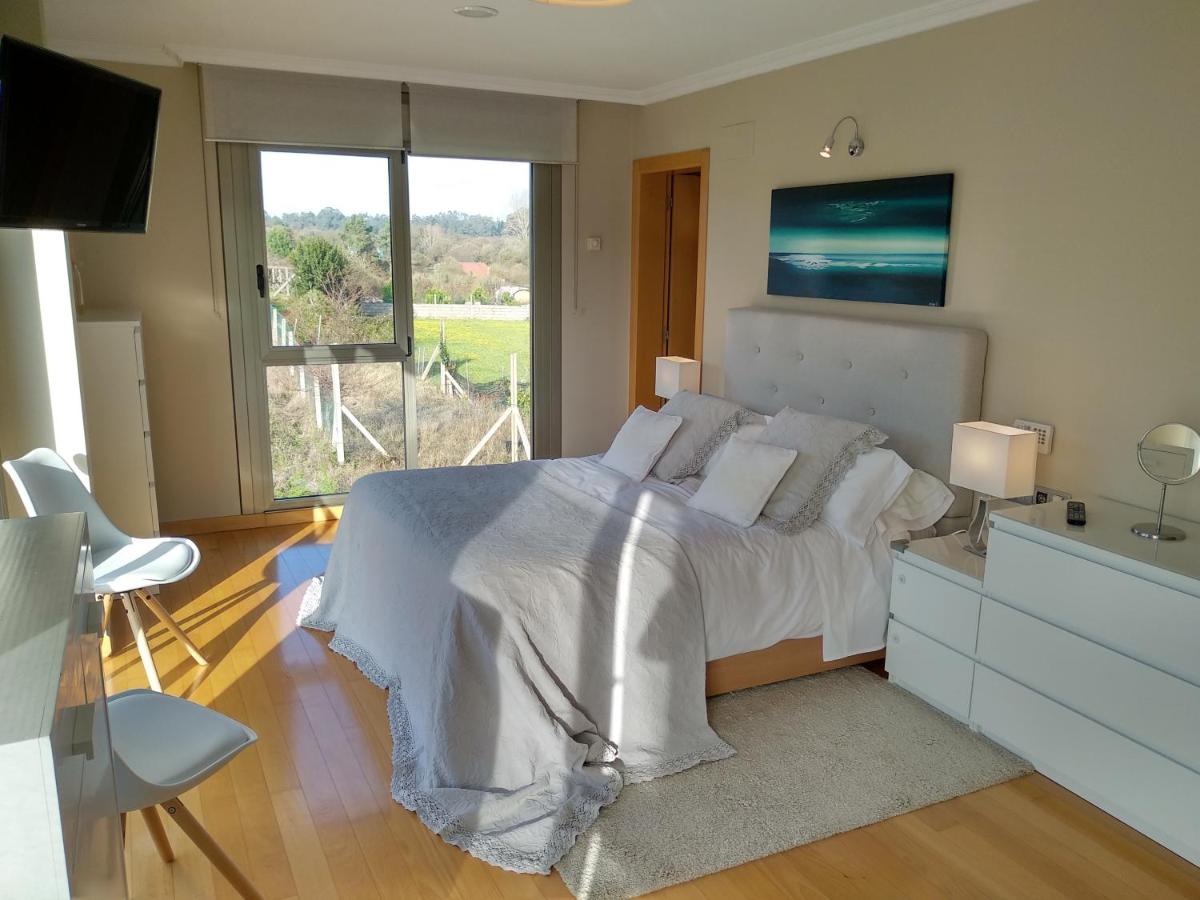 Sanxenxo Casa Rial 47 con PISCINA CLIMATIZADA - Housity