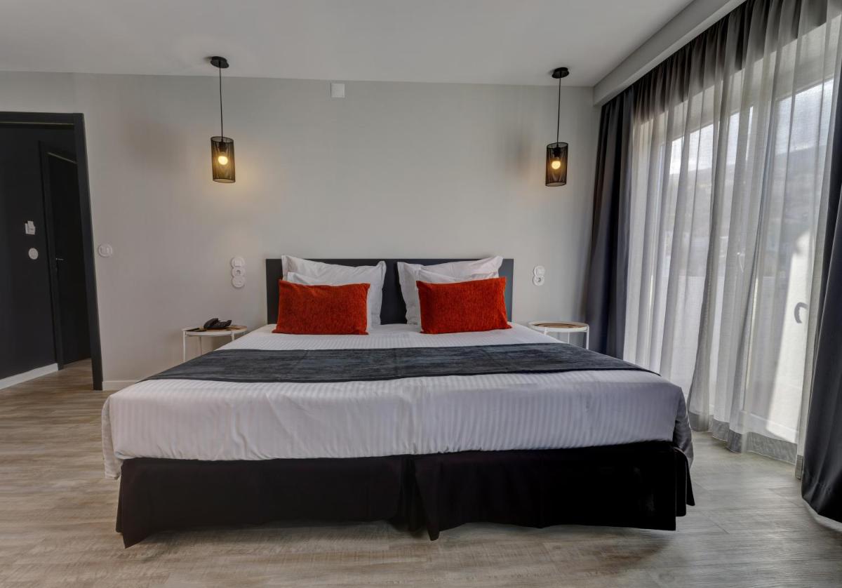 Uma cama ou camas num quarto em Sport Hotel Gym + SPA
