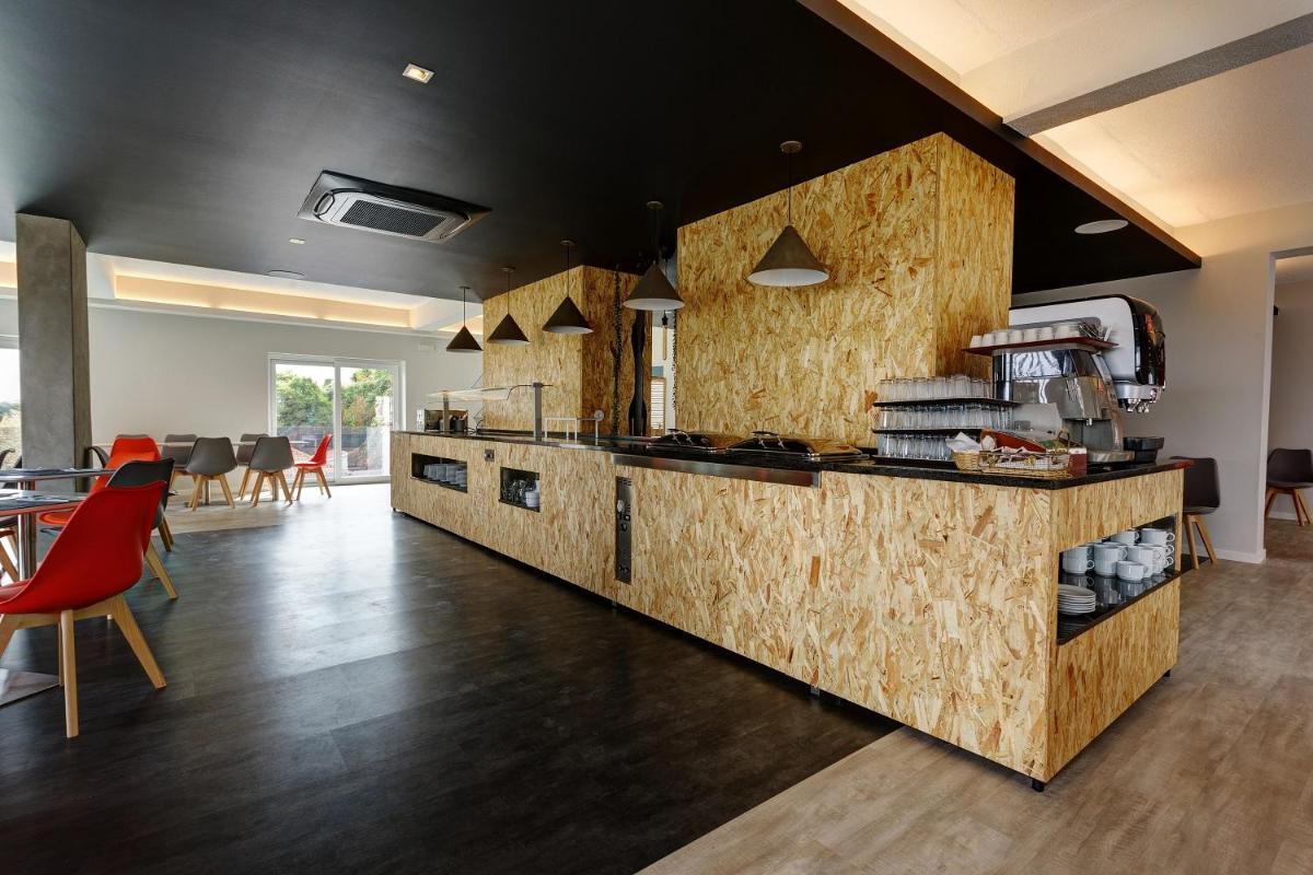 A cozinha ou kitchenette de Sport Hotel Gym + SPA