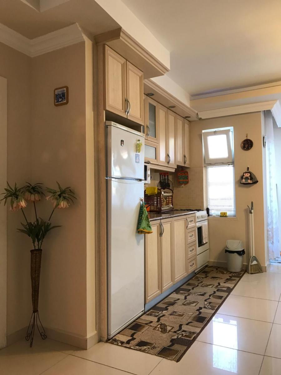Suitetrails - Sunshine apartment at Side beach.