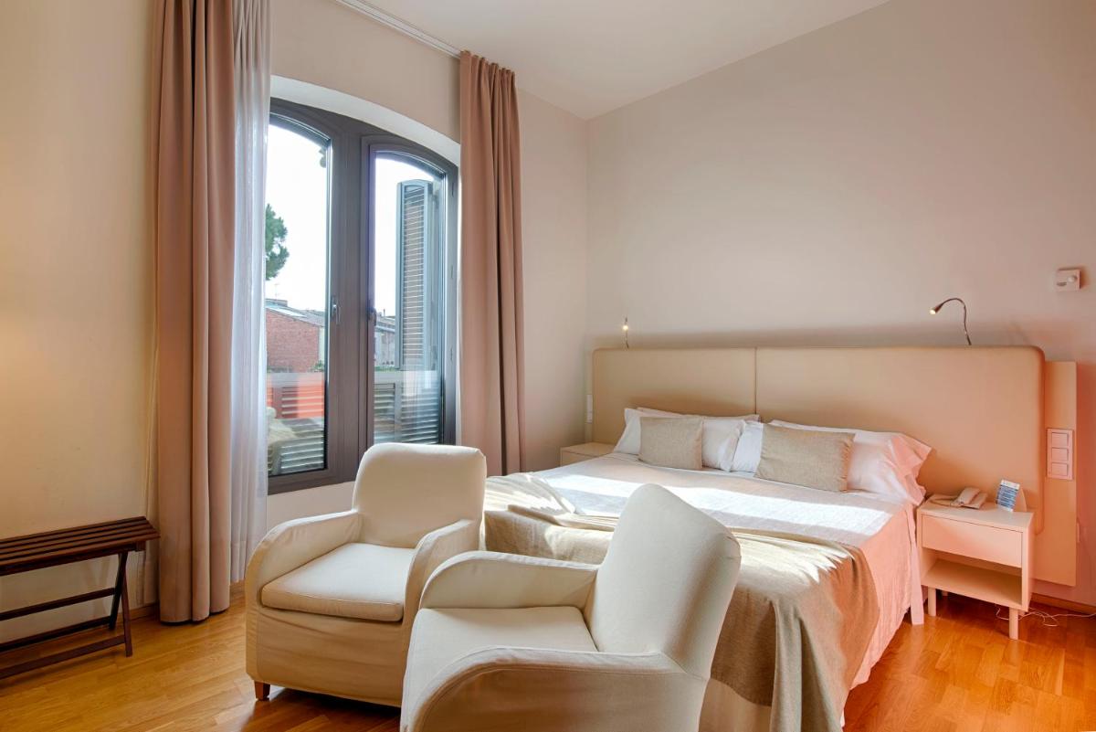 Cama o camas de una habitación en Hotel Balneario Prats