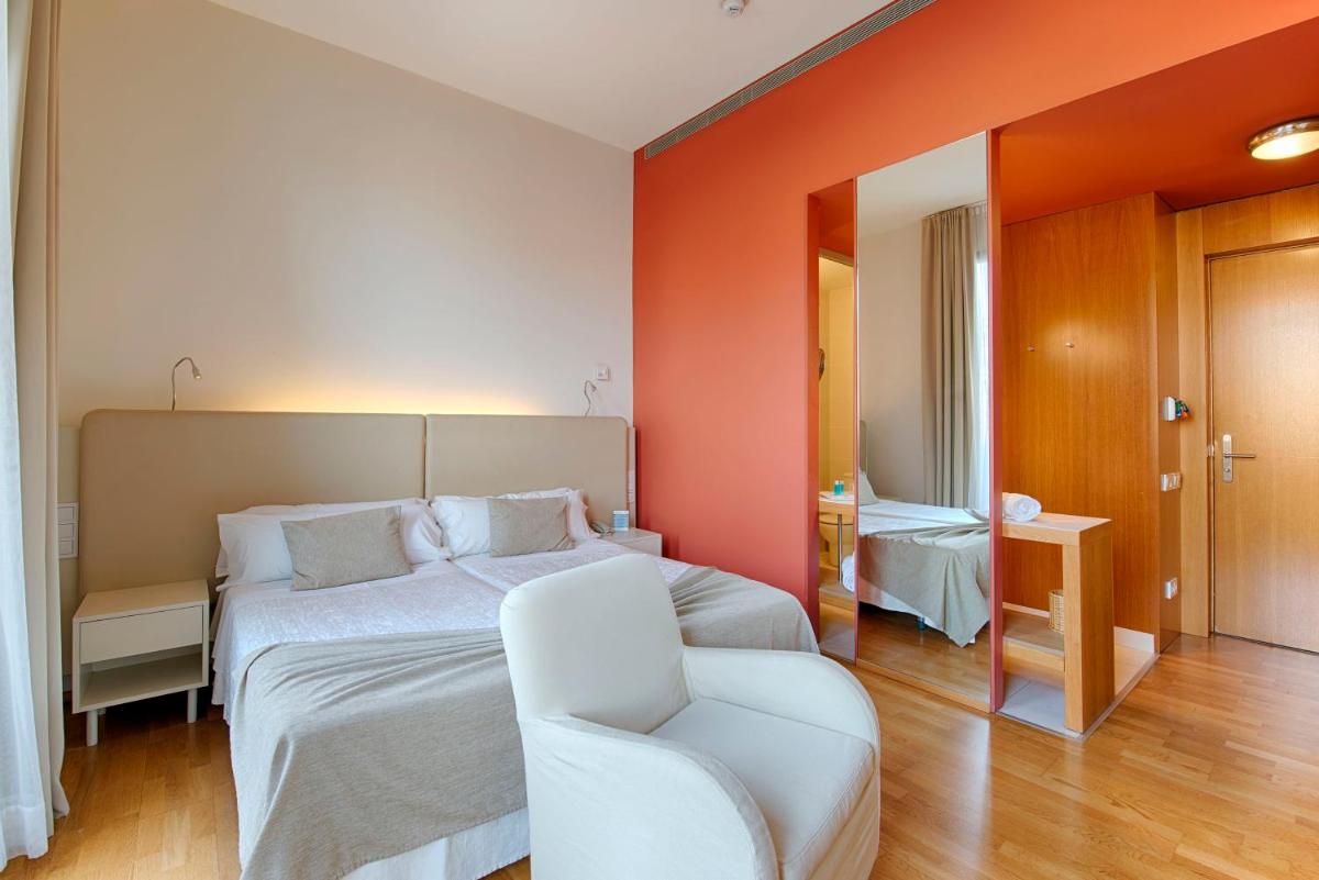 Cama o camas de una habitación en Hotel Balneario Prats