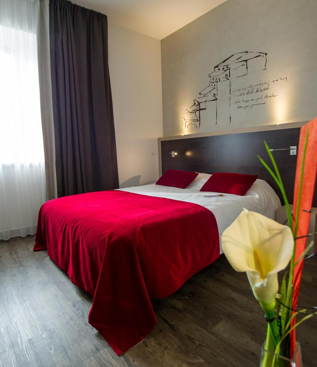 Un ou plusieurs lits dans un hébergement de l'établissement Best Western Plus Villa Saint Antoine Hotel & Spa
