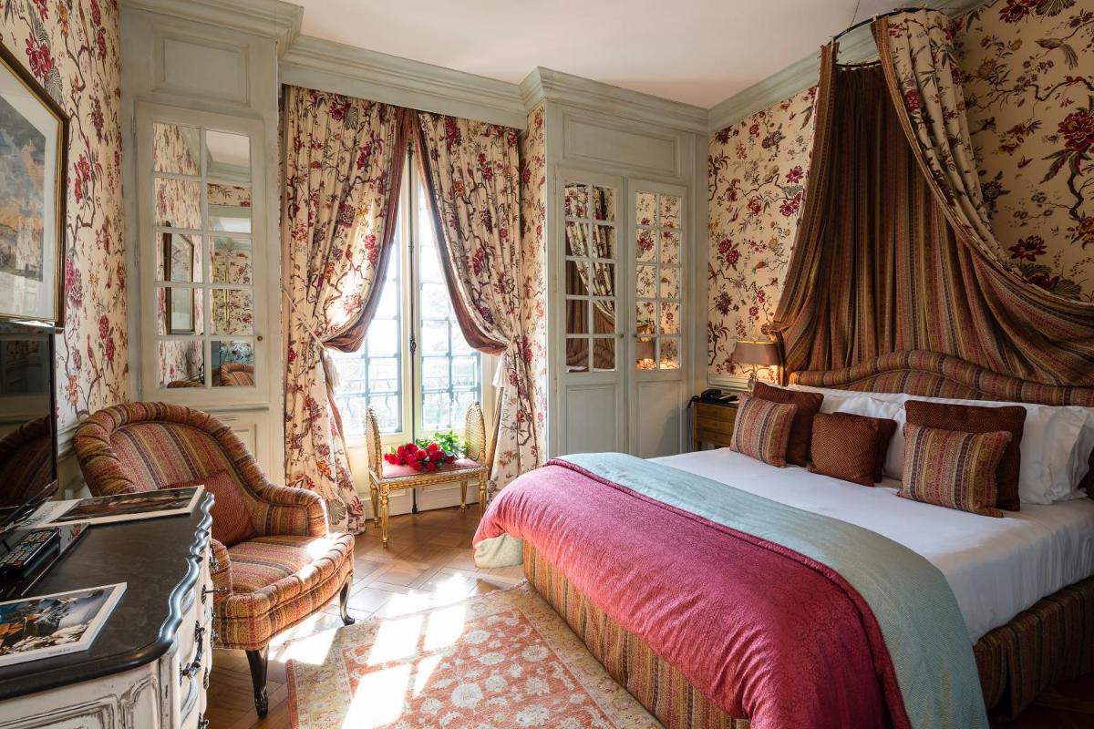 Un ou plusieurs lits dans un hébergement de l'établissement Villa Gallici Hôtel & Spa