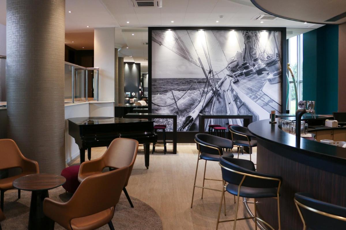 Coin salon dans l'établissement Best Western Plus Hotel Admiral