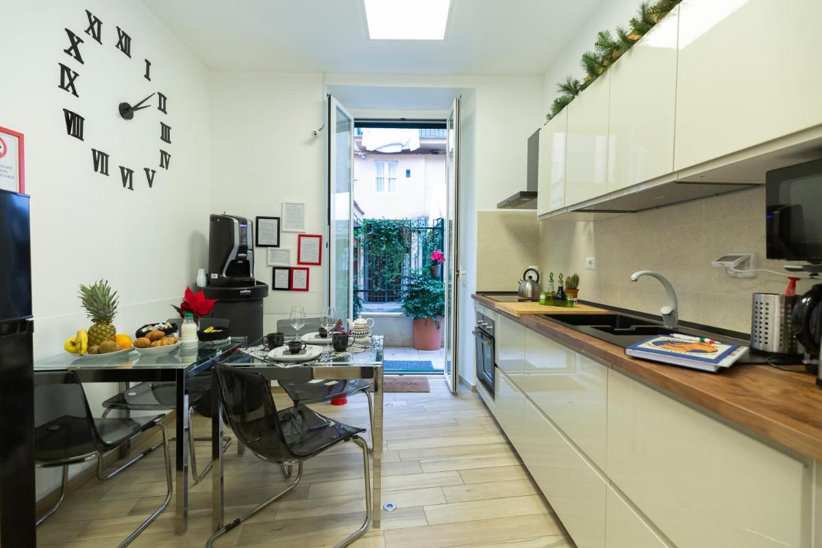Flatinrome Trastevere Deluxe Rooms - Green Patio - Housity