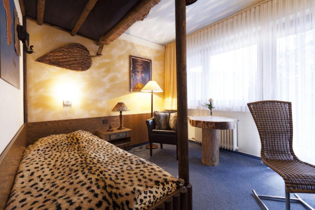 Themen Hotel Terrassen Cafe - Housity
