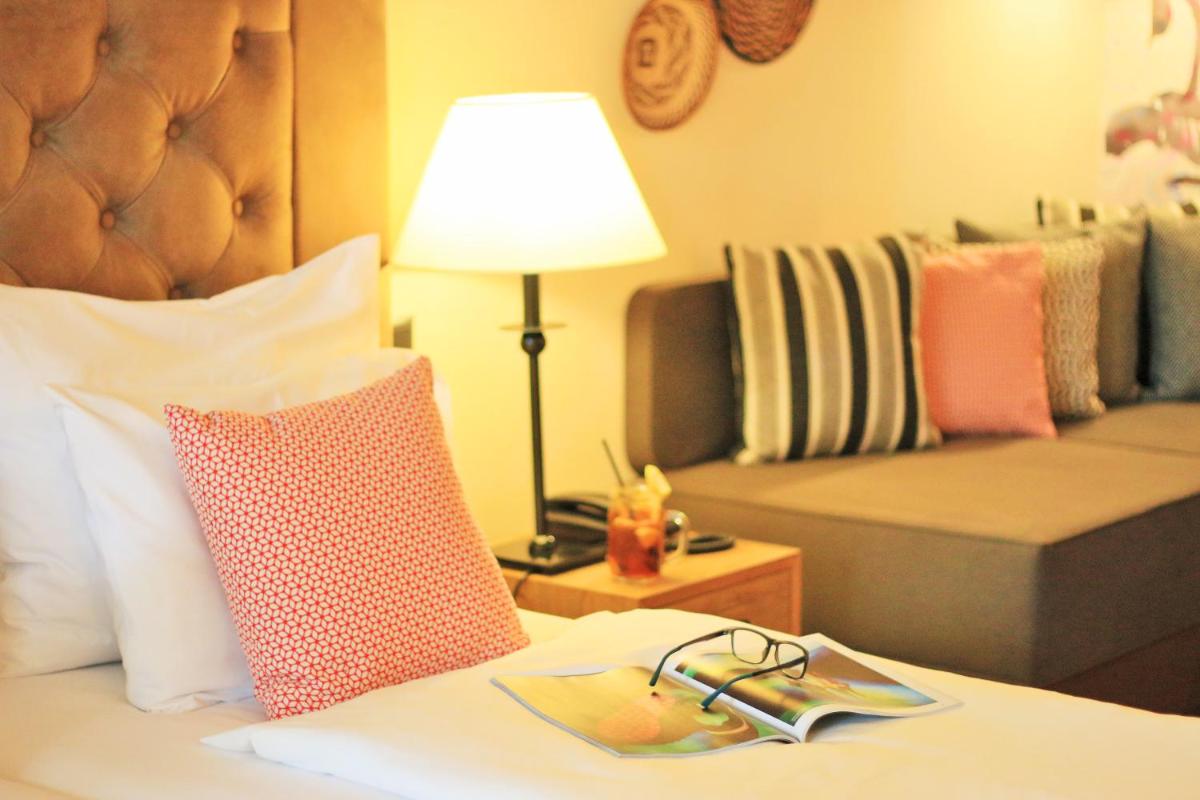 Cama o camas de una habitación en Lindner Hotel Mallorca Portals Nous, part of JdV by Hyatt