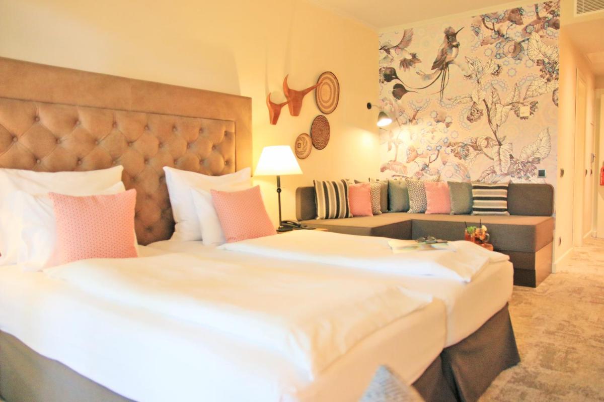 Cama o camas de una habitación en Lindner Hotel Mallorca Portals Nous, part of JdV by Hyatt
