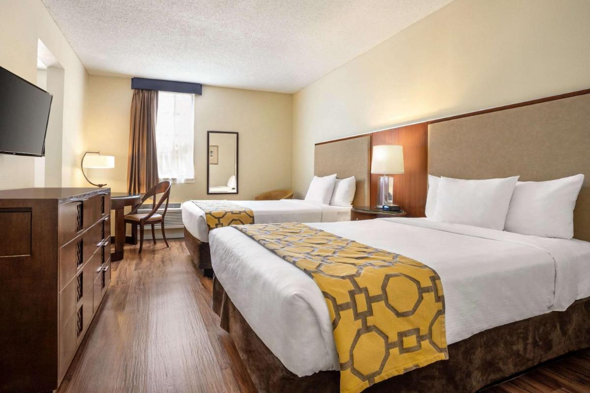 Belmont Inn & Suites - Housity