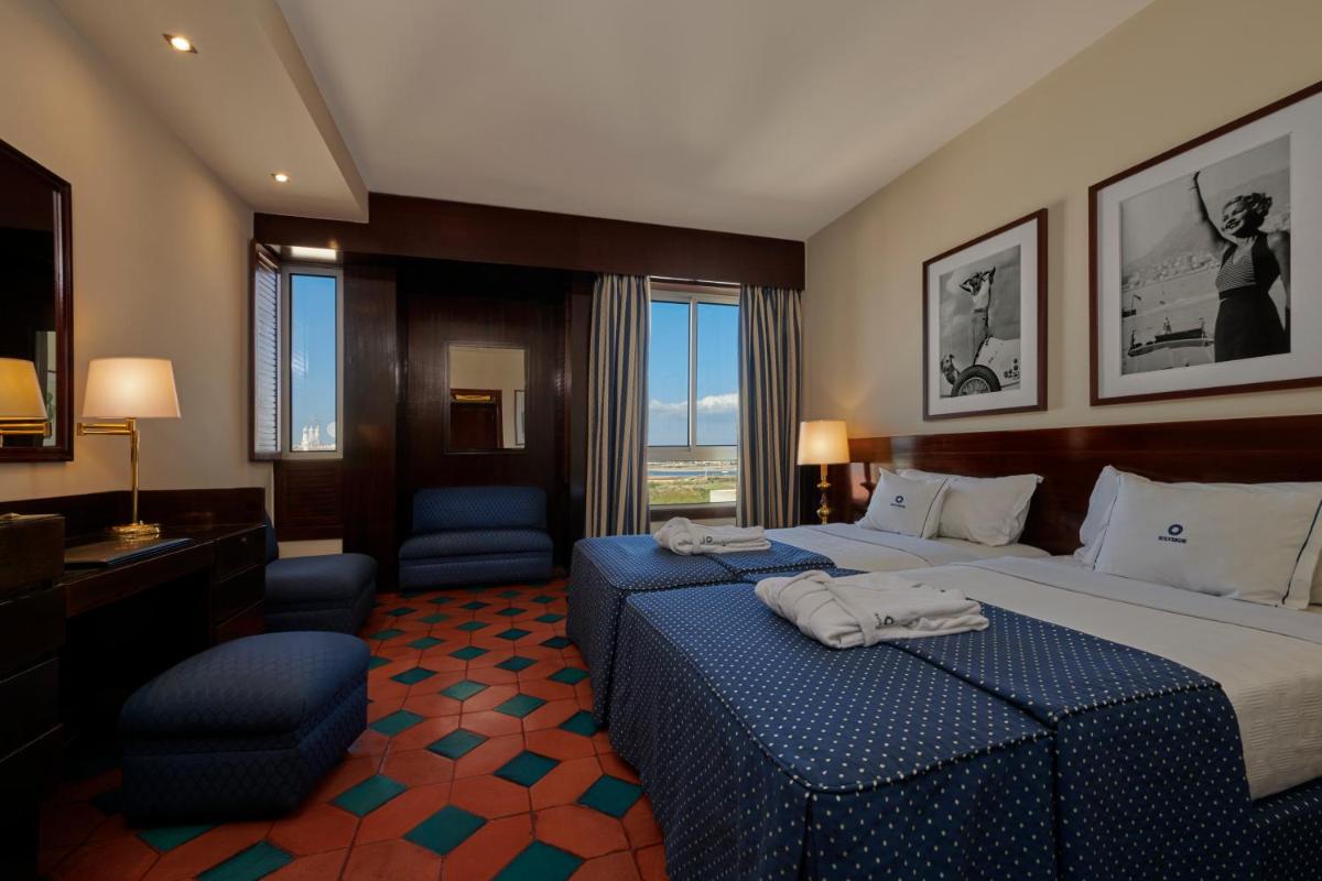 Uma cama ou camas num quarto em Algarve Casino Hotel