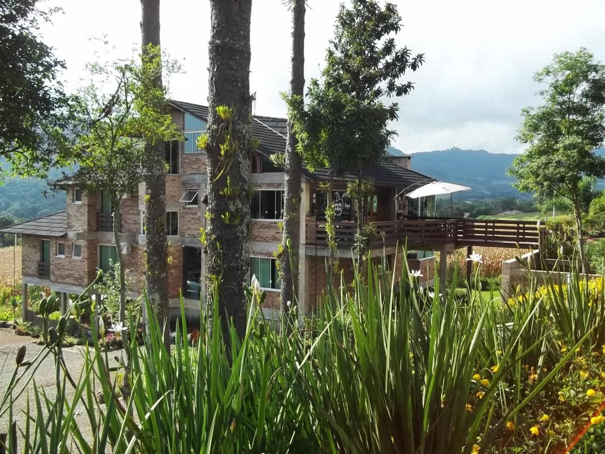 Bina's Haus Pousada, Cafeteria e Atelier - Housity