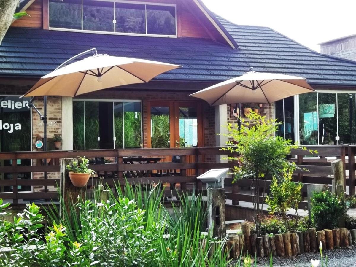 Bina's Haus Pousada, Cafeteria e Atelier - Housity