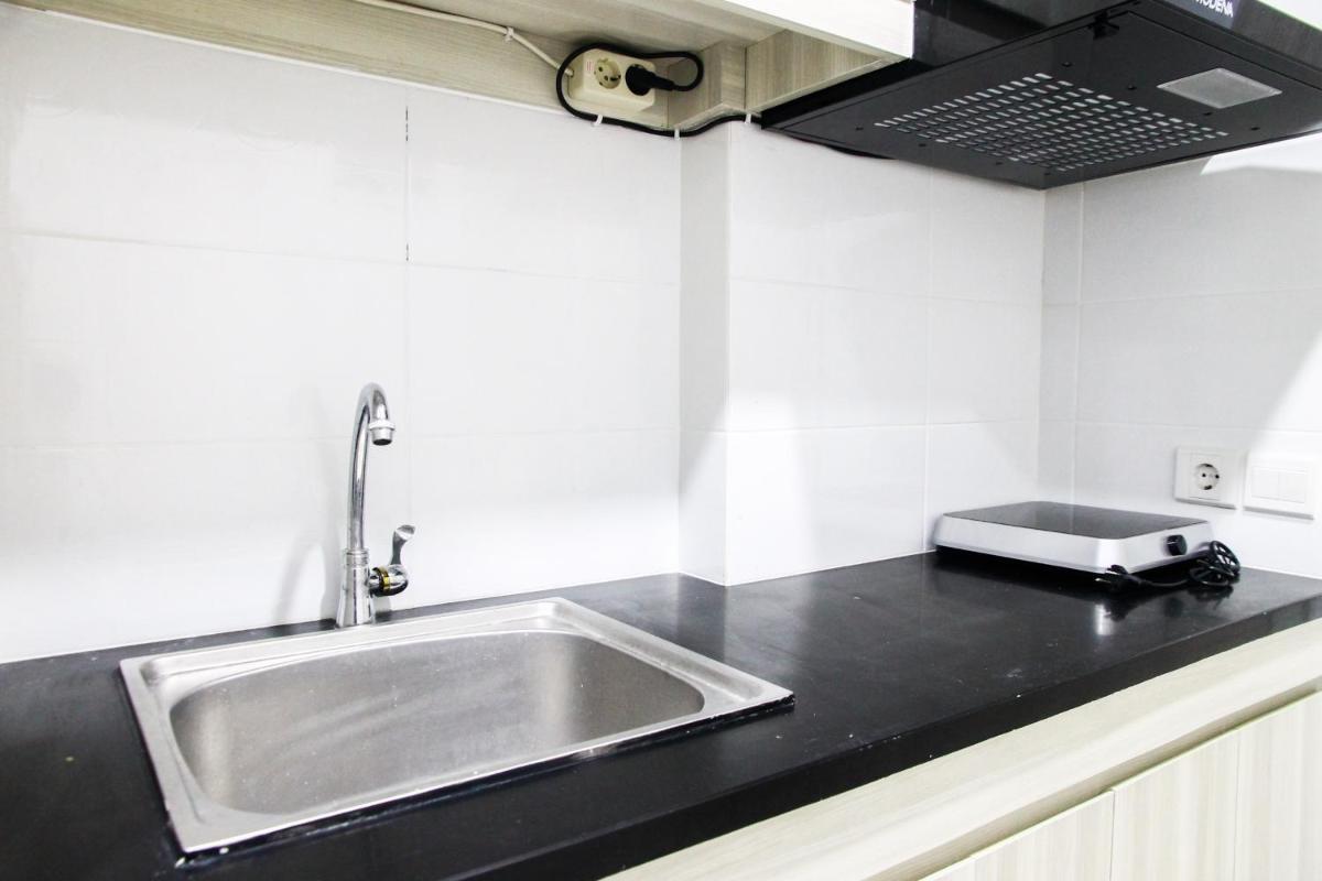 Nice View Studio at Azalea Suites Apartment By Travelio - Housity